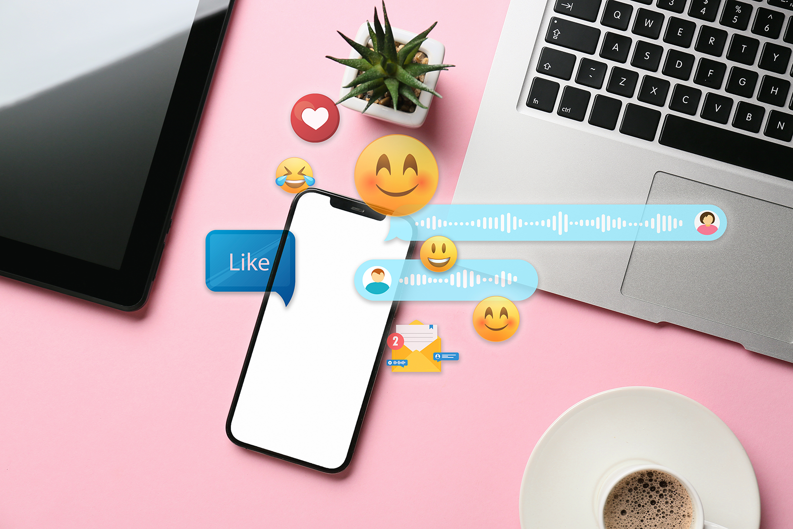 Celular sobre mesa rosa recebendo curtidas e reações de redes sociais ao lado de notebook e xícara de café